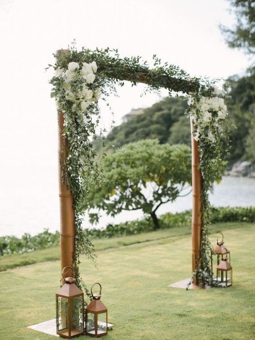 39 Charming Farmhouse Wedding Decor Ideas For Your Big Day 23 Bamboo Arch For Farmhouse Chic Wedding Decor