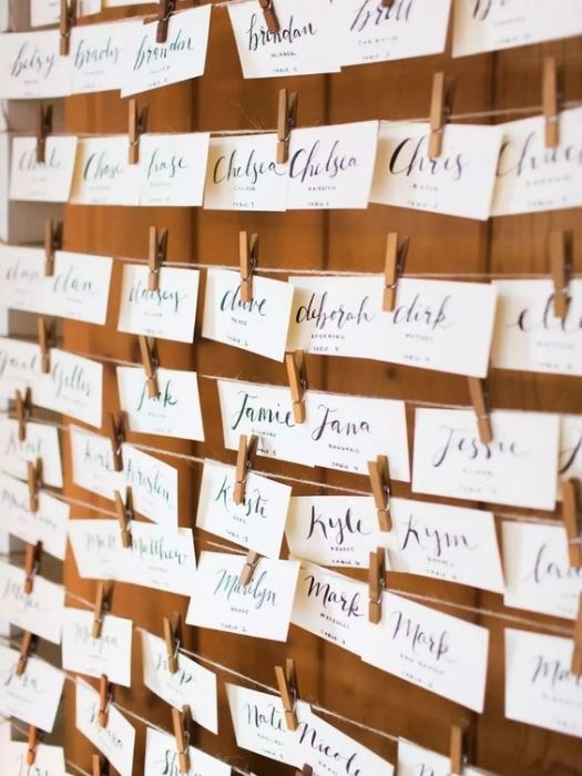 39 Charming Farmhouse Wedding Decor Ideas For Your Big Day 36 Farmhouse Wedding Decor Escort Cards Calligraphy